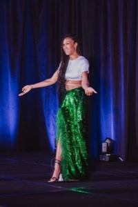 Nicole performing on stage